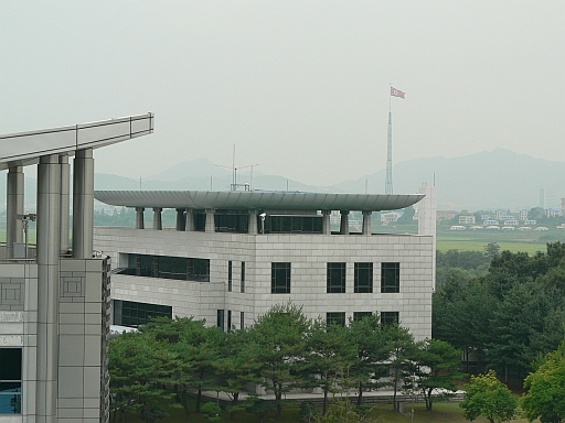north korea flag pole. The buildings and flag pole in
