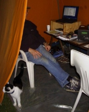 Dave (G3UEG) in the standby 4/6m operating seat with visiting farm cat
