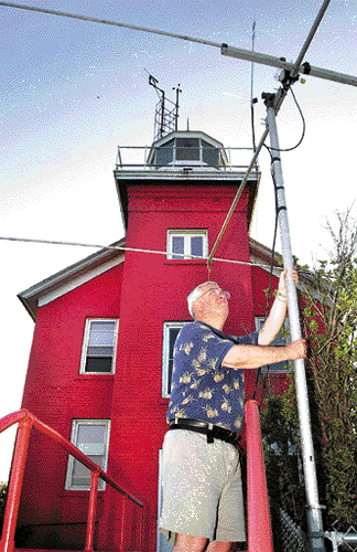 Pete, K8PT inspecting antenna