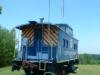The other end of the caboose.  The mast was attached to the ladder with u-bolts and custom mounting plates.