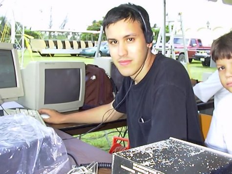 This is me, Jim KP4DR. This photo was from ARRL/AMSAT Field Day 1998 working the Satellite Station as KP4ES at Bacardi Corp, Catao PR.