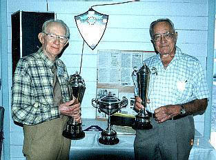 Jim Cowan and Alf Webb VK2UC with old Urunga Trophies