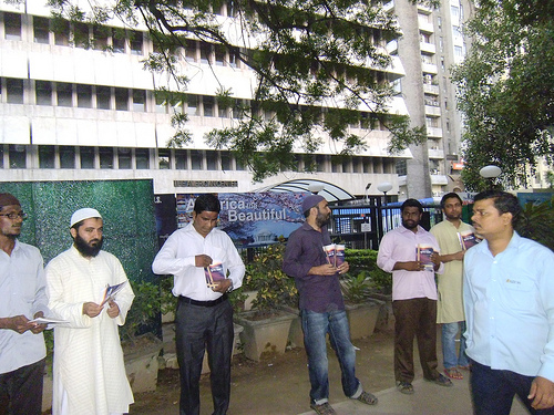 Ideal Protest: Few Muslims distributing books on Prophet Muhammad (pbuh) outside American Center in New Delhi on 21st September 2012.
