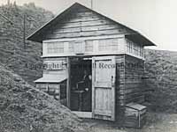 An old photo of a catridge hut