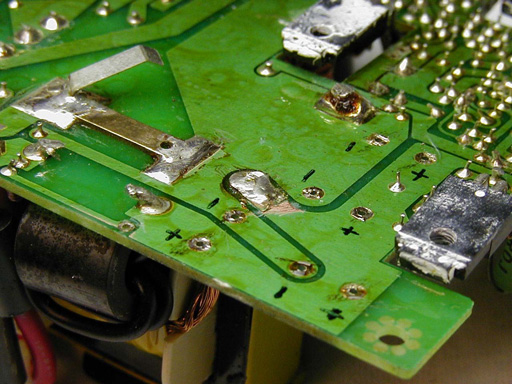 Fig.2: View of damaged L7 land pattern on REG UNIT board. Click for larger image. Copyright 2004, K8AC.