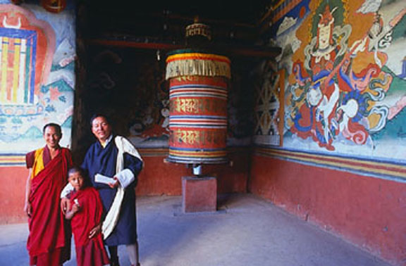 A prayer wheel at the entrance of a Dzong