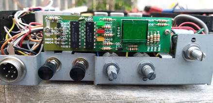 A close-up of a circuit board

Description automatically generated