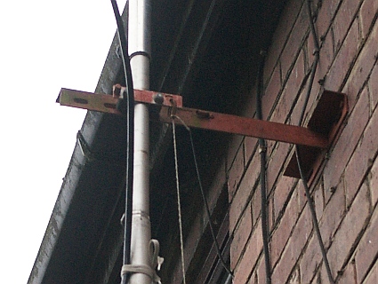 Mast locked in position by gate