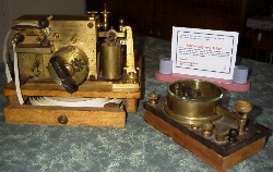 MORSE KEY AND INKER - These early 1900's items were used to send and record morse code sent via telegraph or radio.  The recording tape is driven at a constant speed by clock-work and the inking wheel is triggered via the electro-magnetic effect of the incoming signal.