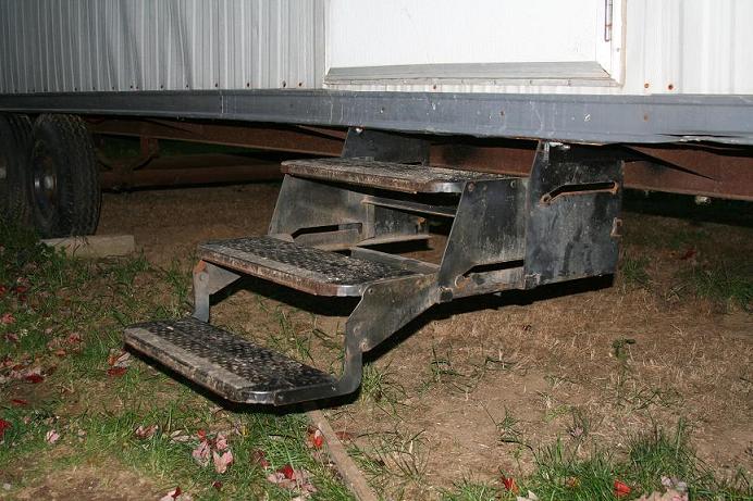 Fold out stairs salvaged from a burnt camper.