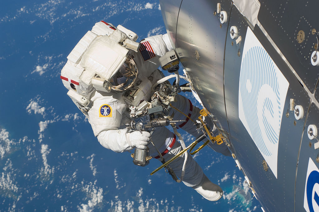 Randolph Bresnik installing ARISS Antenna during STS-129 EVA