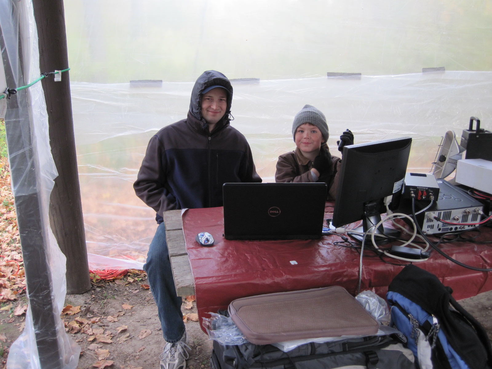 Greg N0GES (a new Boone Co ARES Member) with boy scout Roland (son of KD0VCX) operating a digital JOTA station