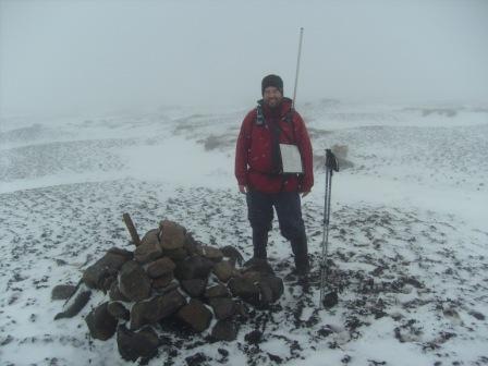 Tom on the snow-swept summit of Kinder