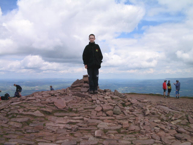 Jimmy on the summit cairn of Pen y Fan