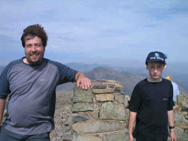 Tom and Jimmy at the trig on Scafell Pike
