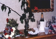 A picture of the flowers and Champagne after the wedding