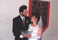Roy and Paula gazing into each others eyes as they admire the beautiful Salad Bowl that Linda gave them as a wedding gift.