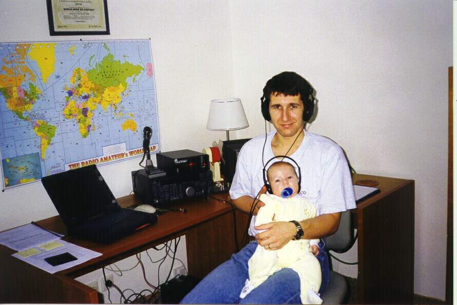 in my Hamshack with my son Lukas (3 months old ) 02/2000