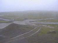 Water is flowing where the road should have been.