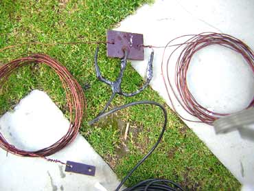 The 40m dipole getting ready for installation just by the side of a swimming pool 