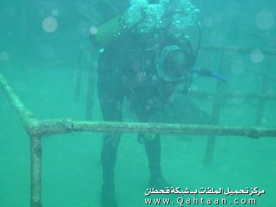 Scuba Diver praying (Long Bowing - Ruku) under water