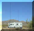 rv with both poles.JPG (89414 bytes)