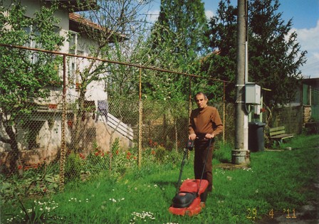 Ivan mowing the front yard