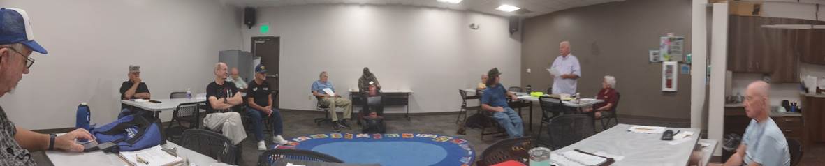 A group of people in a room

AI-generated content may be incorrect.