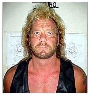 Dog Chapman -After his June, 2003 arrest in Puerto Vallarta, Mexico. Chapman was charged with felony restraint after he traveled south of the border to track down Max Factor cosmetics heir Andrew Luster, who had jumped bail and fled the U.S. in the middle of his California rape trial.