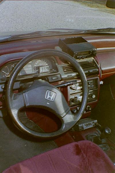 Picture of the inside of the Honda, with the Yaesu FT2500M 2 meter tranceiver and the ICOM IC-38 220 MHz tranceiver