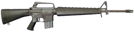 Early Model M16 with duckbill flash suppressor, triangular grip, lack of forward assist and brass deflector.