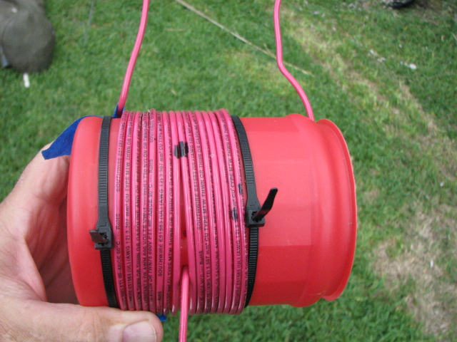 Coupling loop between red PVC jacket wire windings