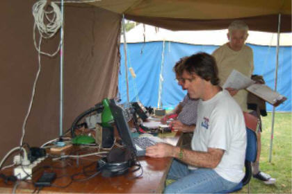 Wes, ZL3TE on 40m CW with Steve, ZL1FS hiding behind and Bob, ZL1AFU standing in the background